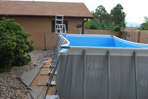 This is when I weighed the cost of water, the imminent collapse of the pool, and fact that the pavers on this side were higher than the bottom.